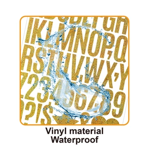 Macro view of waterproof gold glitter vinyl letter stickers under flowing water