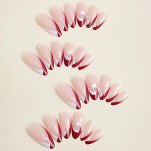 French almond press-on nails featuring red and white Christmas hat holiday patterns