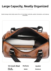 Interior view of caramel brown soft leather handbag showing large storage capacity