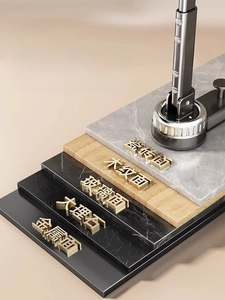 Detail view of telescopic suction cup hanger base showing strong adhesion on tile and marble