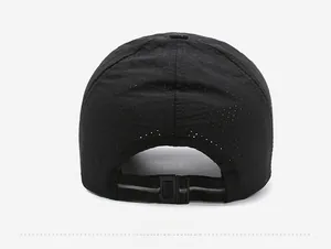 Detail view of the breathable black mesh back and reflective strap on the baseball cap