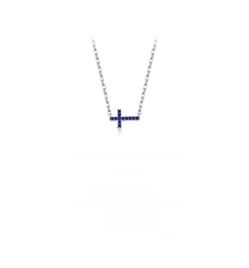 Detailed close-up of S925 sterling silver cross necklace with blue crystal embellishments