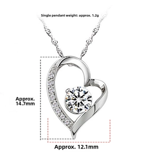 Detail view of heart pendant with cubic zirconia, height 14.7mm and width 12.1mm