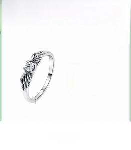 Detail view of S925 silver angel wing ring with 2.25g weight and 0.16cm band width