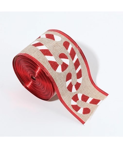 Close-up of burlap Christmas ribbon with glittery candy cane pattern and red satin edges