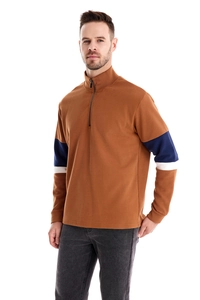 Detail of caramel brown quarter-zip sweatshirt with blue and white sleeve stripes