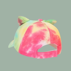 Detail view of colorful tie-dye cat ear baseball cap with adjustable velcro strap