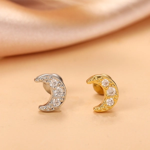 Sparkling crescent moon stud earrings with cubic zirconia inlay in gold and silver finish