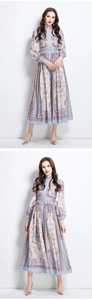 Detail of elegant sky blue floral court style dress with stand collar and matching waist belt