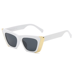 Fashionable white cat eye sunglasses with grey lenses and gold metal accents for women