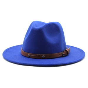 Detail of royal blue wool fedora hat featuring brown faux leather band and silver buckle