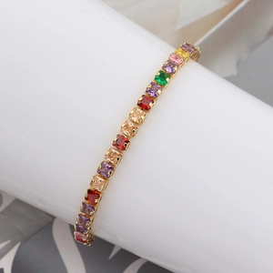 Close-up of rainbow cubic zirconia bracelet with square stones in gold-plated settings