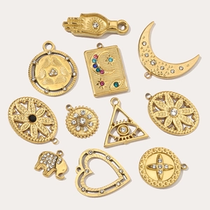 Set of 11 gold titanium steel DIY pendants with star, heart, and eye designs with zircons
