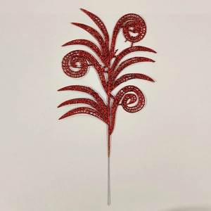 Close-up of red glitter Christmas leaf branch with hollow pattern and wire stem for decor