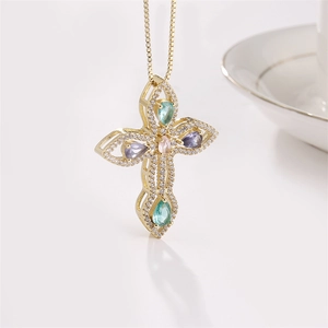 Copper cross necklace in gold finish with multicolored teardrop gemstones and micro-pave zircons