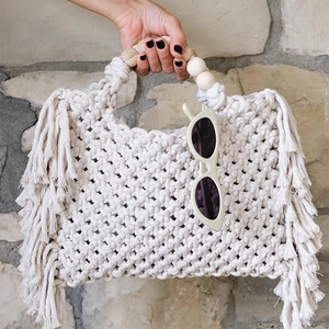 Bohemian woven mini handbag with tassel fringe and wooden bead handle in cream white