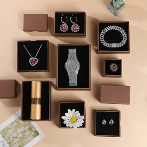 Retro brown textured jewelry boxes showcasing necklaces, bracelets, rings and luxury watches