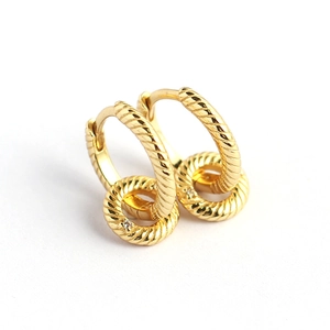 Golden braided texture hoop earrings with small diamond pendants on white background