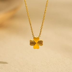 Elegant 18k gold-plated four-leaf clover pendant necklace with sleek stainless steel chain