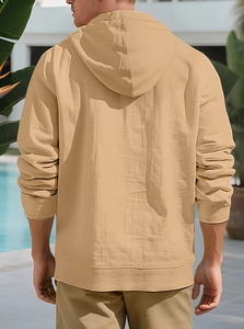 Men's khaki cotton linen hooded shirt with buttons, outdoor view by the swimming pool