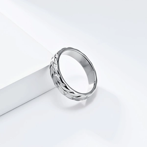 Elegant silver stainless steel tulip flower ring with detailed leaf texture on white background