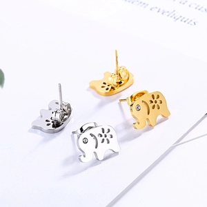 Golden and silver elephant stud earrings with hollow flower patterns and crystal eyes