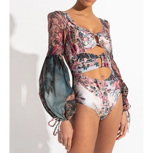 Floral print long sleeve one-piece swimsuit with cutout details and matching sarong