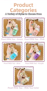 Five assorted colors of cute cat boba tea keychains with holographic laser wrist straps