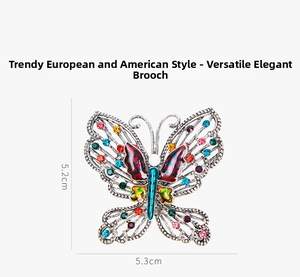Detailed view of butterfly brooch with colorful rhinestones and red enamel, size 5.2cm x 5.3cm