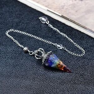 Handcrafted hexagonal cone pendulum featuring seven chakra natural crushed crystal stones