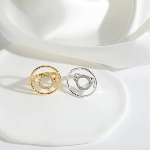 Exotic geometric open ring in gold and silver finish with sparkling pave set crystals