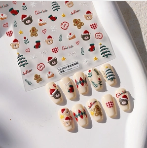 Détails d'autocollants gaufrés pour ongles d'ours de Noël rétro avec texture 3D et motifs