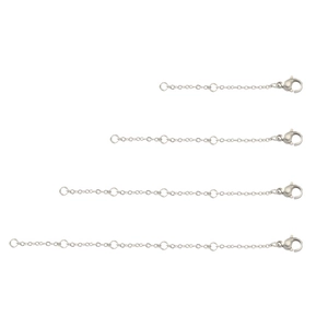 Detail showing four different lengths of silver stainless steel extender chains with lobster clasps