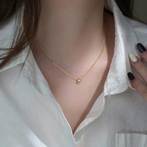 Minimalist S925 sterling silver necklace with golden bean pendant for women