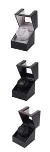 Detailed view of three single watch winder styles with carbon fiber and leather textures