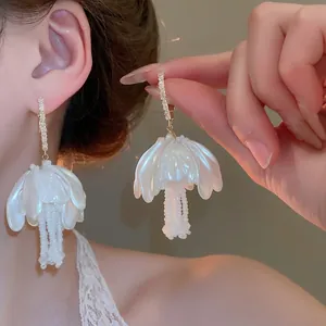 Elegant floral tassel earrings with pearl beads and sparkling crystals for women