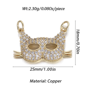 Detailed view of a gold cat mask pendant with dimensions 25mm by 18mm and copper material