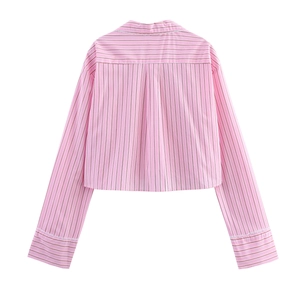 Back view of a sweet pink and white striped crop shirt with white lace trim details