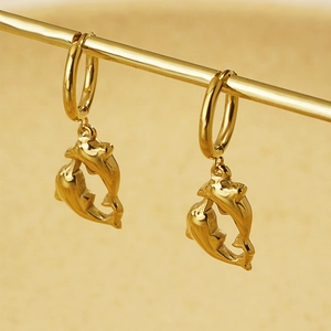 Polished gold stainless steel dolphin hoop earrings for women with ocean theme