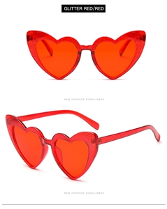 Detail view of heart-shaped glitter red sunglasses with new upgraded frame