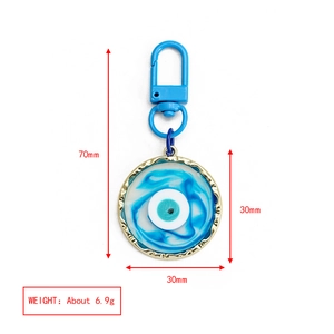 Blue evil eye keychain dimensions 70mm by 30mm with gold metal charm weighing 6.9g