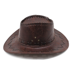 Detail of vintage crackle brown cowboy hat with black stitching and metal vents