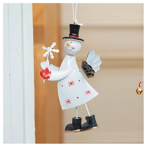 Detailed view of handcrafted metal snowman Christmas ornament hanging on a string