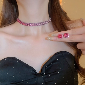 Model wearing a luxury pink rhinestone necklace and matching square stud earrings set