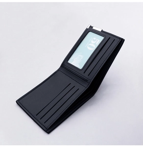 Close-up of black leather wallet interior showing card slots and transparent ID window