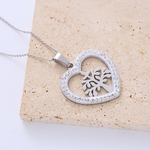 Silver heart-shaped Tree of Life pendant necklace with sparkling crystal rhinestones