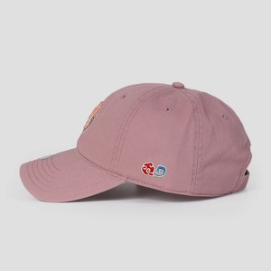 Detail of pink cotton baseball cap featuring exquisite traditional cloud embroidery