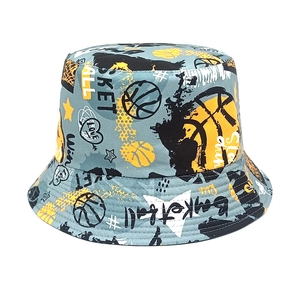 Detail view of light blue basketball pattern bucket hat with street style prints