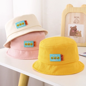 Cappello a secchiello per bambini con patch smiley per protezione solare all'aperto
