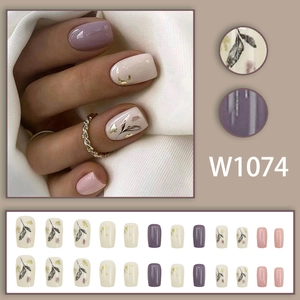 Short square purple press-on nails with leaf pattern, gold foil and glossy finish